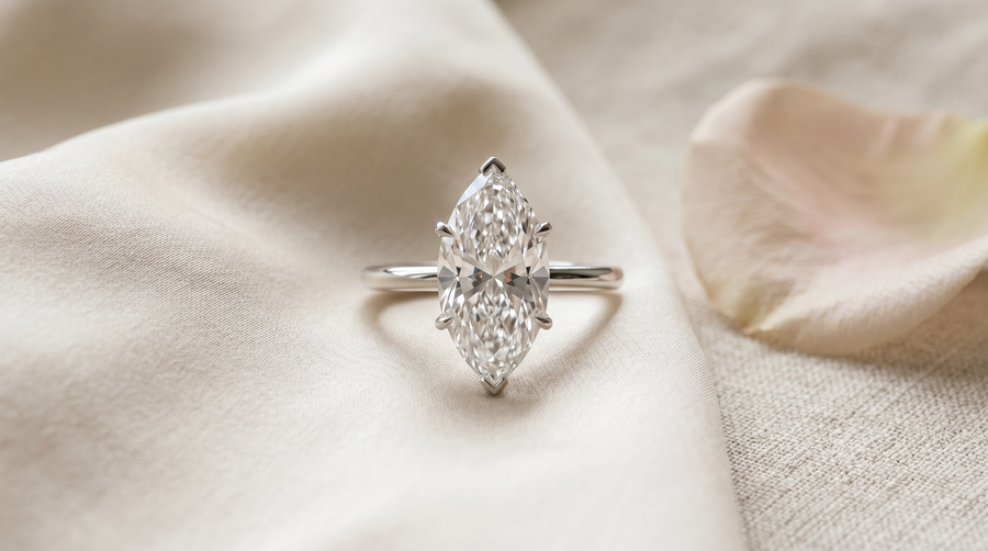 Lab grown marquise cut diamond engagement ring on slim minimalist white gold band, Selena Gomez engagement ring style