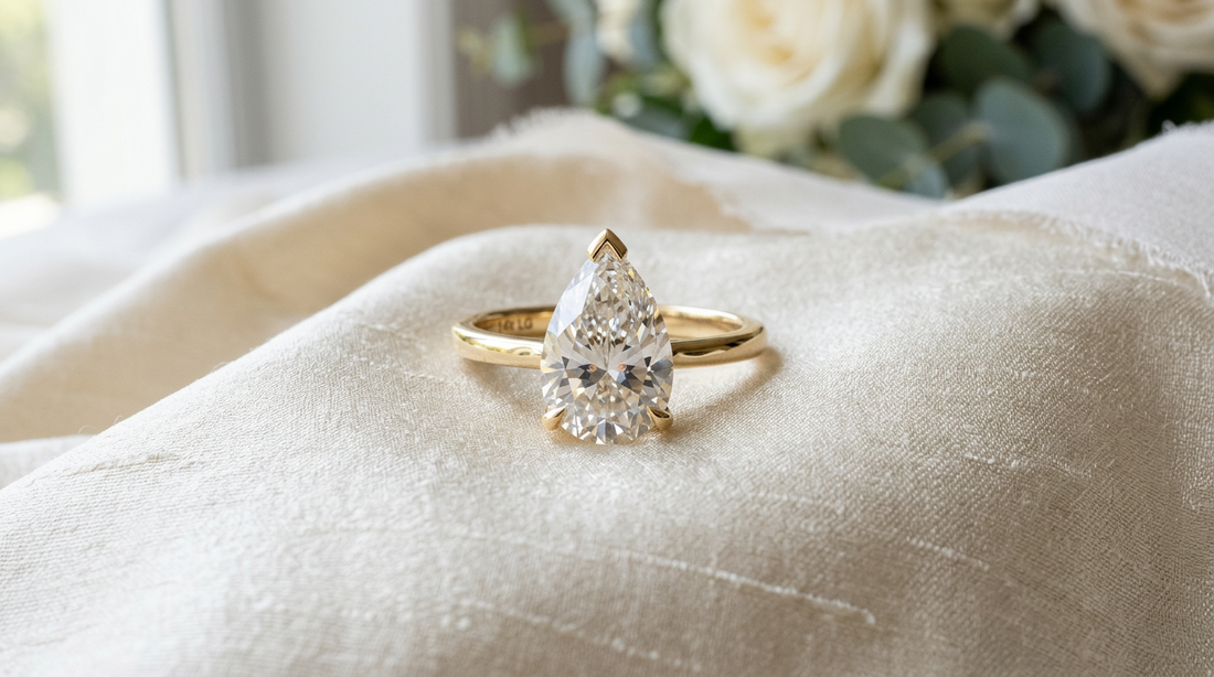 2 carat pear cut lab grown diamond engagement ring point-up in 14k yellow gold V-prong solitaire