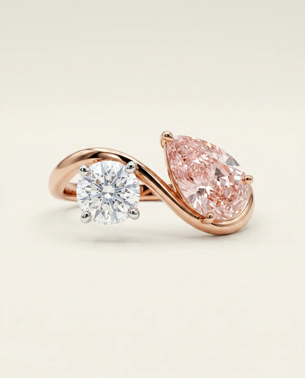 1.5 Carat Fancy Vivid Pink Lab Grown Diamond Toi et Moi Ring · Pear & Round Two-Stone in Two-Tone Gold