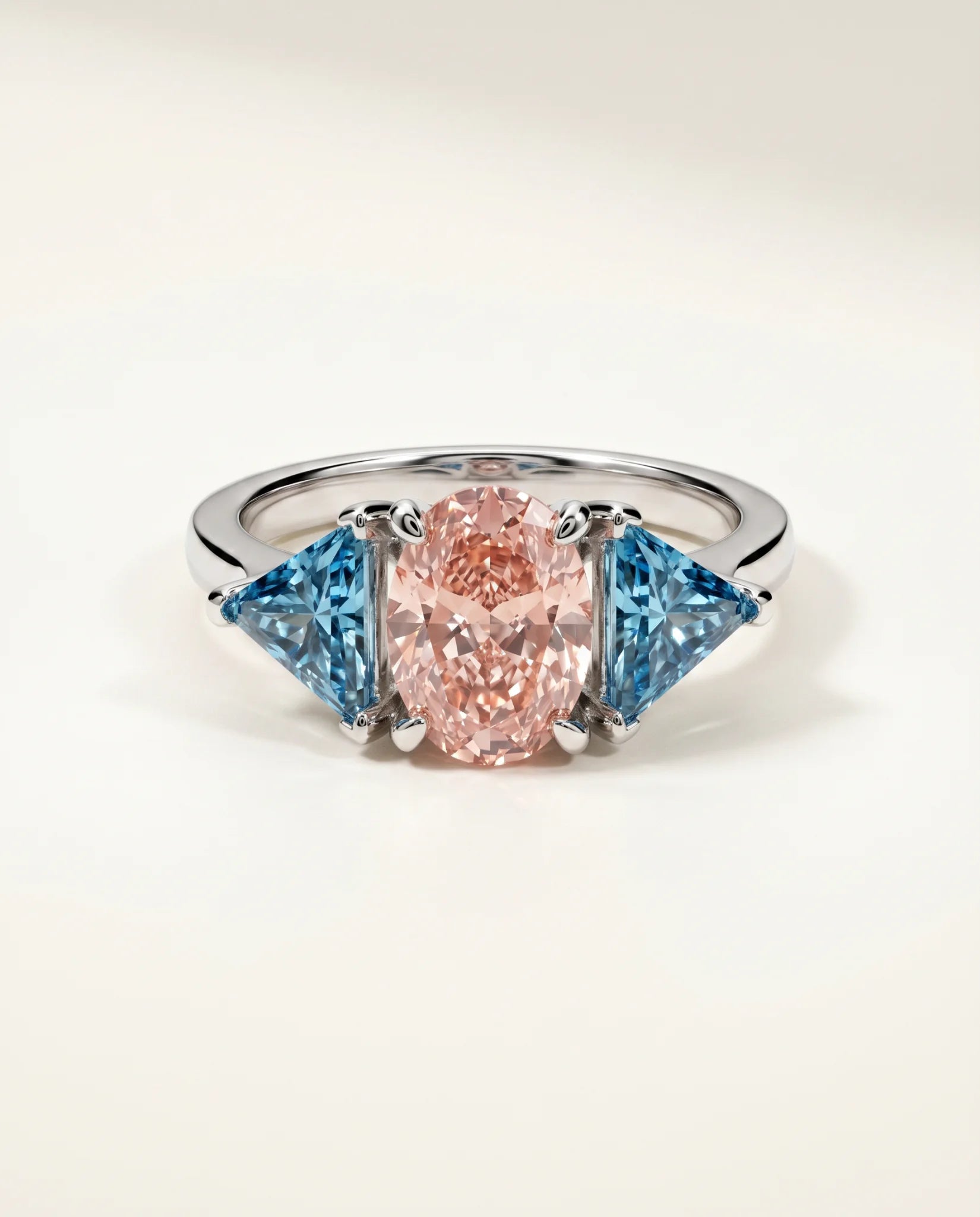 Ready to Ship 2 Carat Fancy Vivid Pink Oval Three-Stone Blue Trillion Diamond Ring — view 2