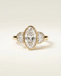 Ready to Ship 3.5 Carat Colorless Elongated Oval Three-Stone Half-Moon Yellow Gold Diamond Ring — view 1