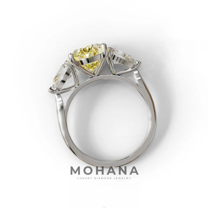 3 Carat Yellow Oval Cut Lab Grown Diamond Three Stone Engagement Ring with 0.50 Carat Pear Side Stones