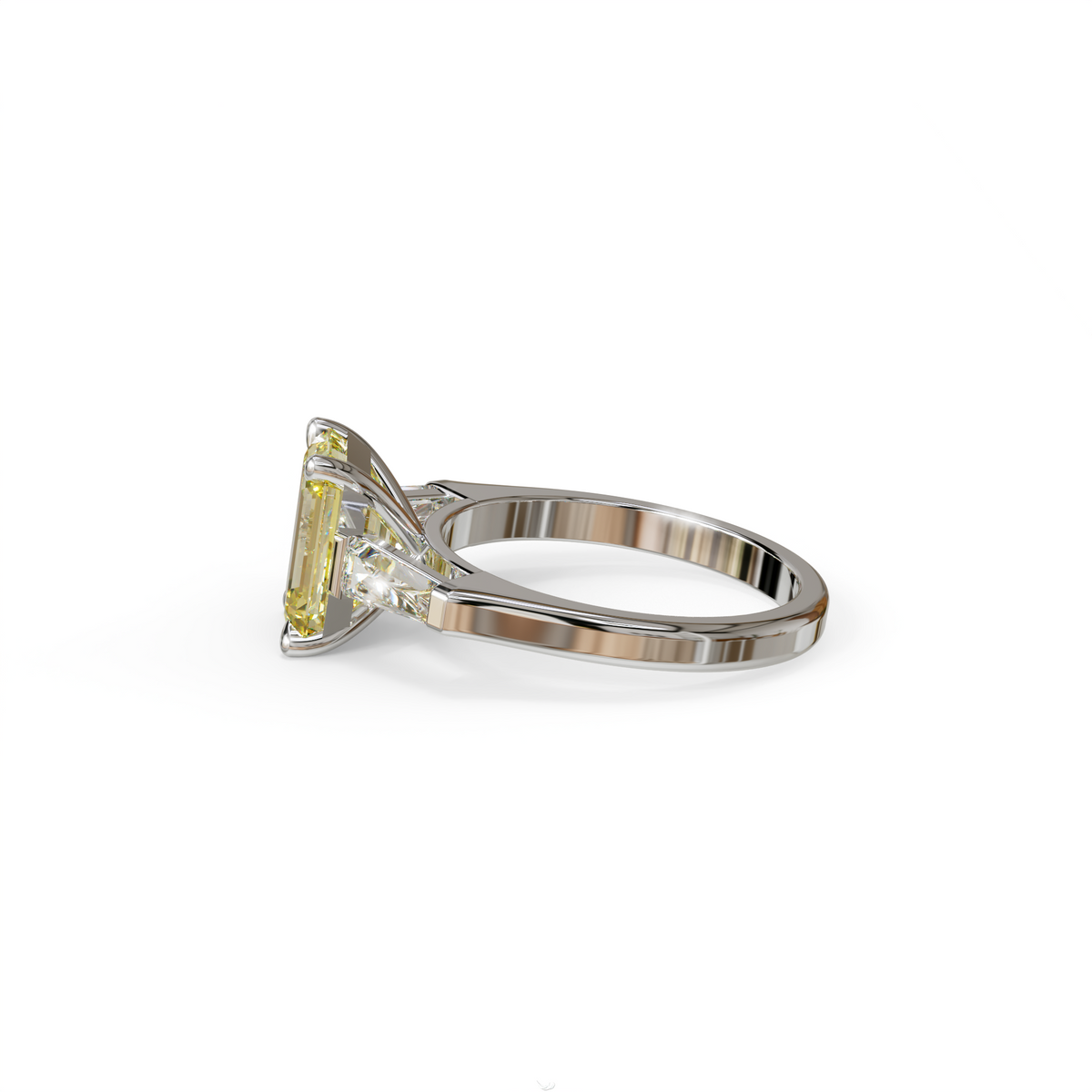 3 Carat Yellow Emerald & Tapered Baguette diamond ring