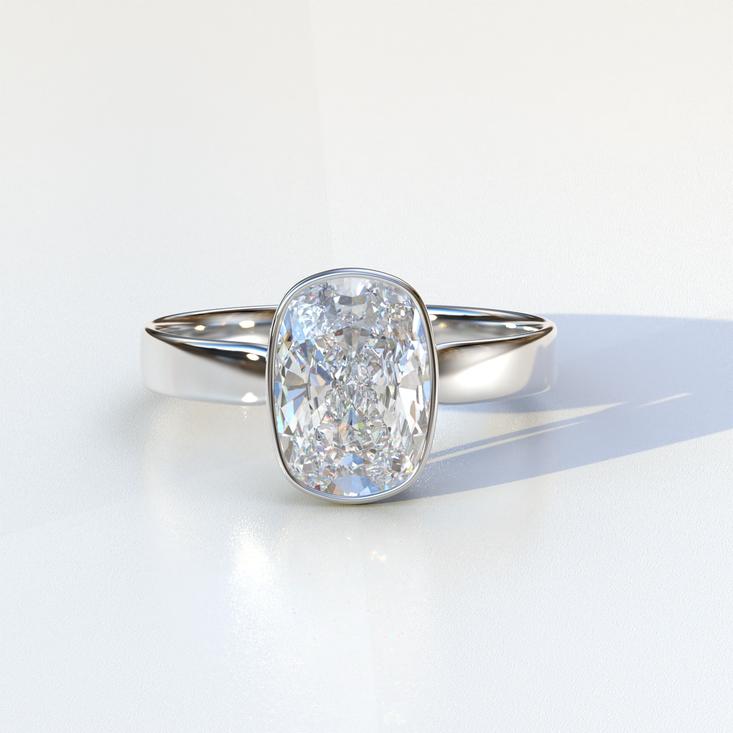 Elongated cushion cut lab grown diamond ring

E VVS lab created diamond engagement ring

Bezel set lab diamond solitaire ring

Ethical lab diamond engagement ring Astrae

Lab grown cushion cut bezel engagement ring