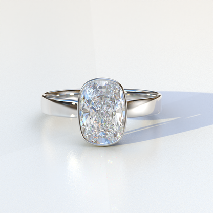 Elongated cushion cut lab grown diamond ring

E VVS lab created diamond engagement ring

Bezel set lab diamond solitaire ring

Ethical lab diamond engagement ring Astrae

Lab grown cushion cut bezel engagement ring