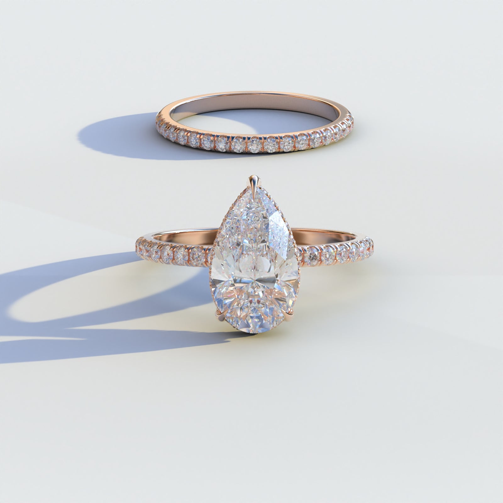Exquisite E VVS Carat Pear-Shaped Hidden Halo Pave Diamond