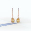 Cleopatra - Pear Cut Yellow Color Diamond Stud Earrings | Halo & Pave Setting | Certified - 1 Carat Tw. Lab Diamond