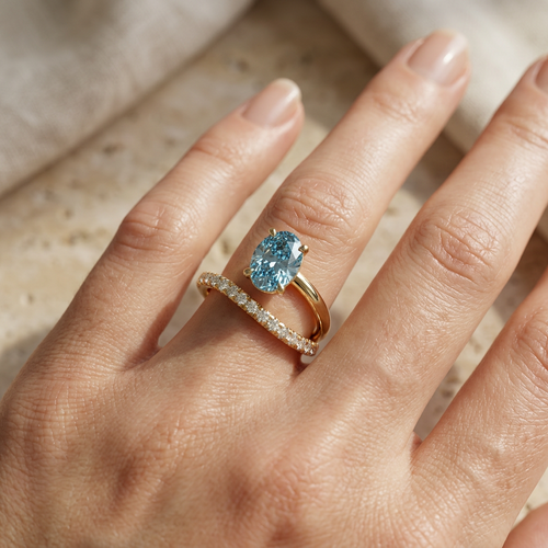 1.5 Carat Blue Oval Cut Lab Diamond Bypass Ring – Pavé Wrap Design