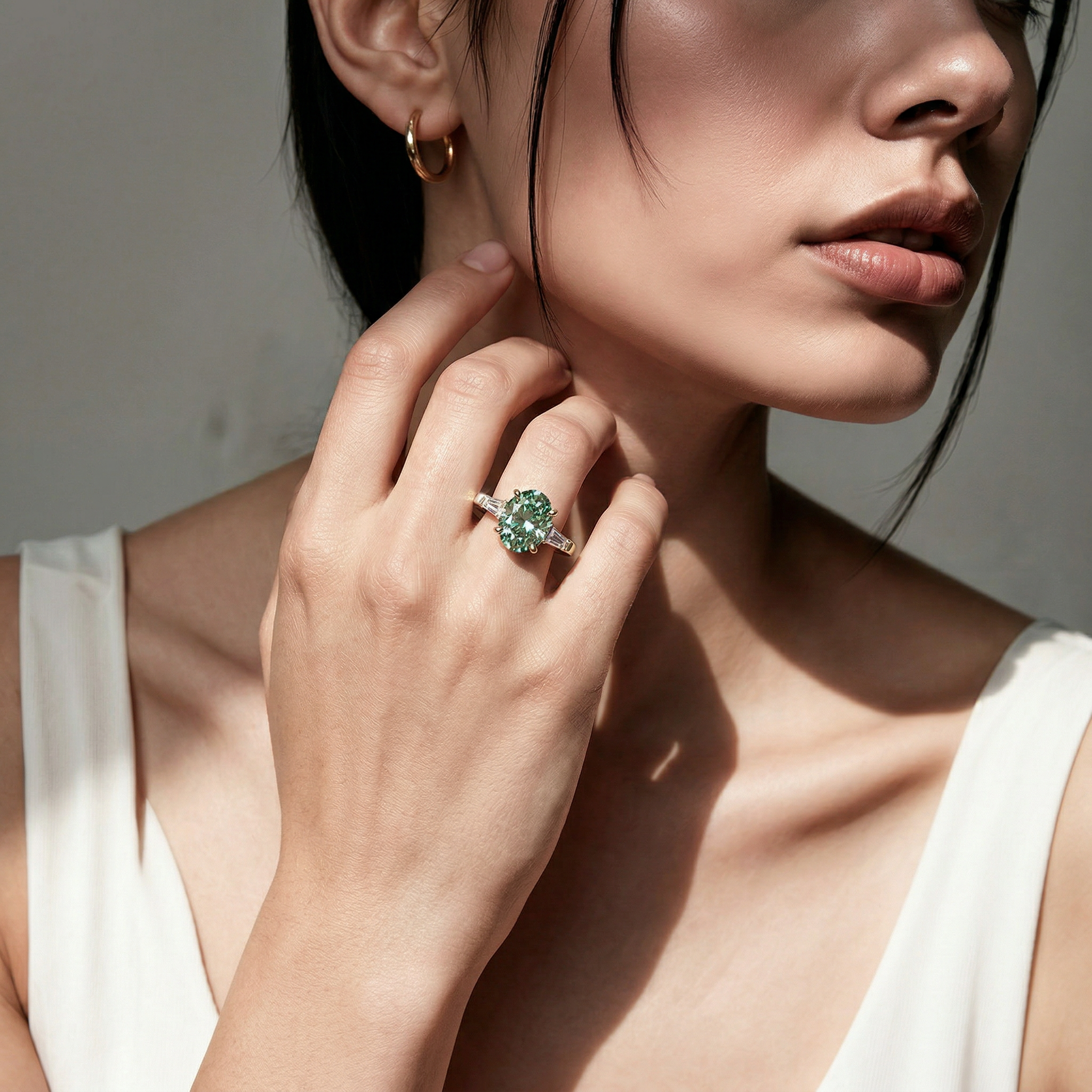 3.75 Carat Fancy Green Oval & Tapered Baguette Lab Grown Diamond Three Stone Engagement Ring